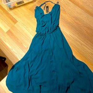 Tagged and never worn other than initial try on.